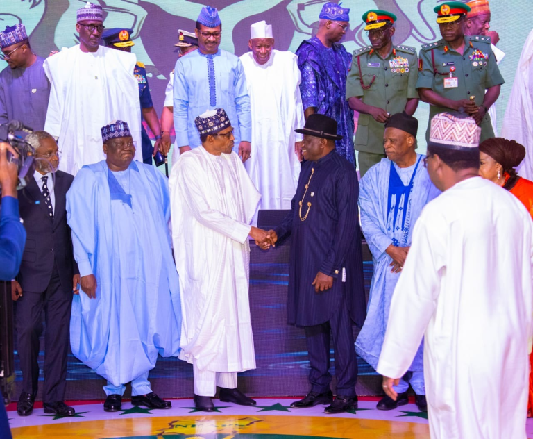 Buhari presenting award to Goodluck Jonathan, Wike, others 