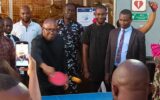 Peter Obi playing table tennis