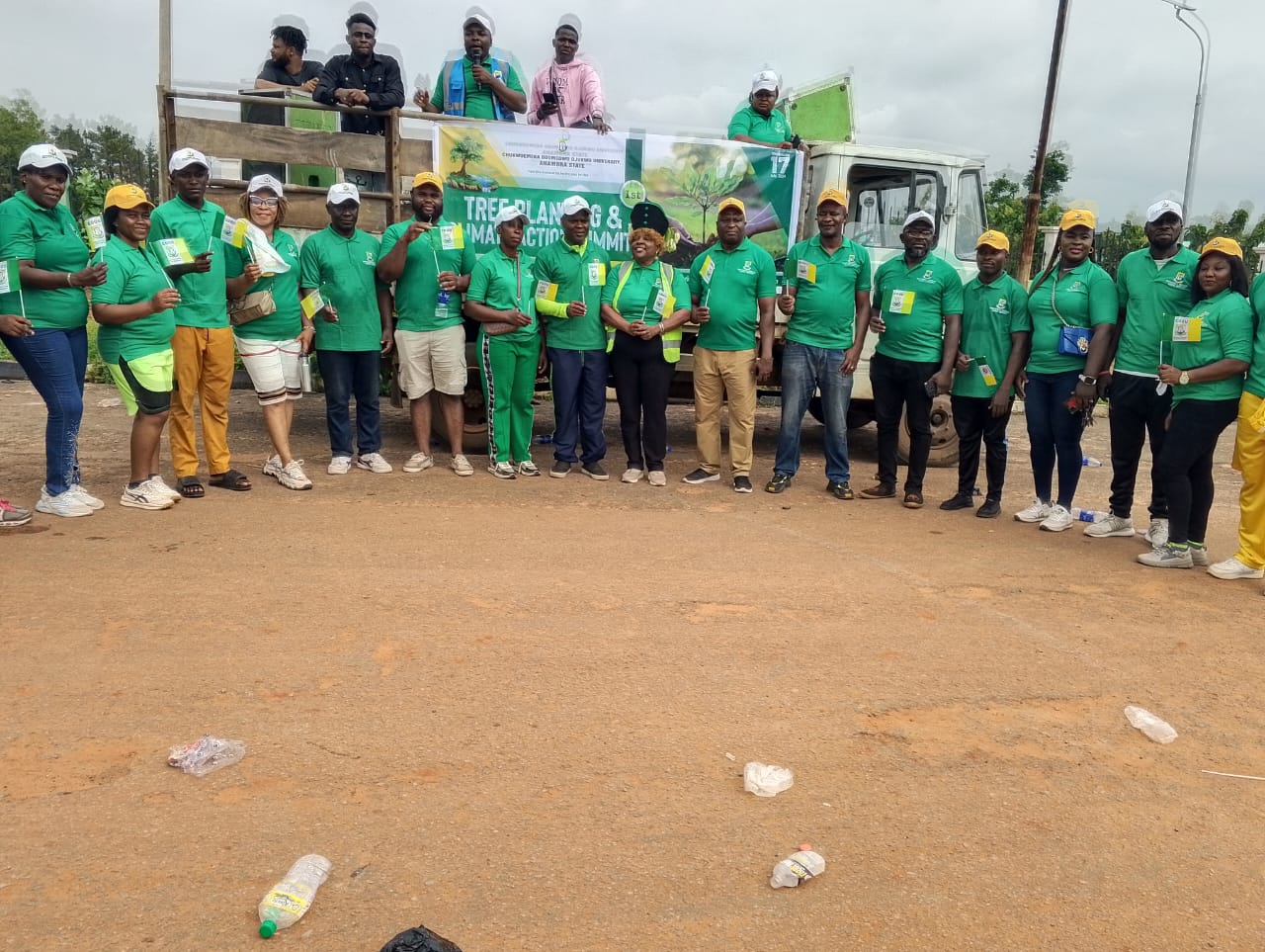 Cross section of COOU staff at the tree planting road exercise 