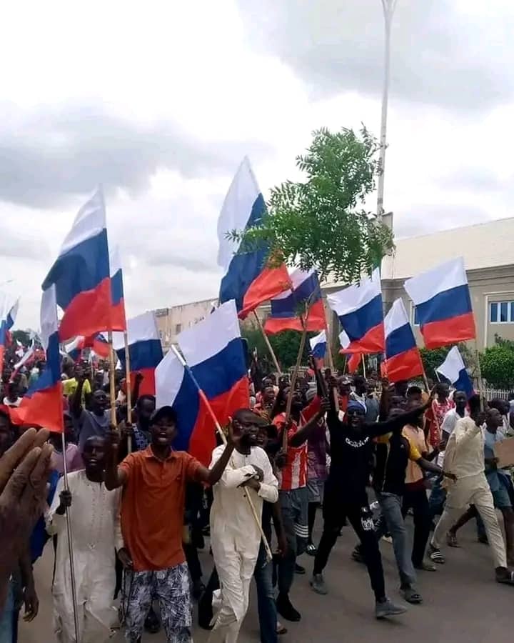 Northern protesters hoist Russian flags